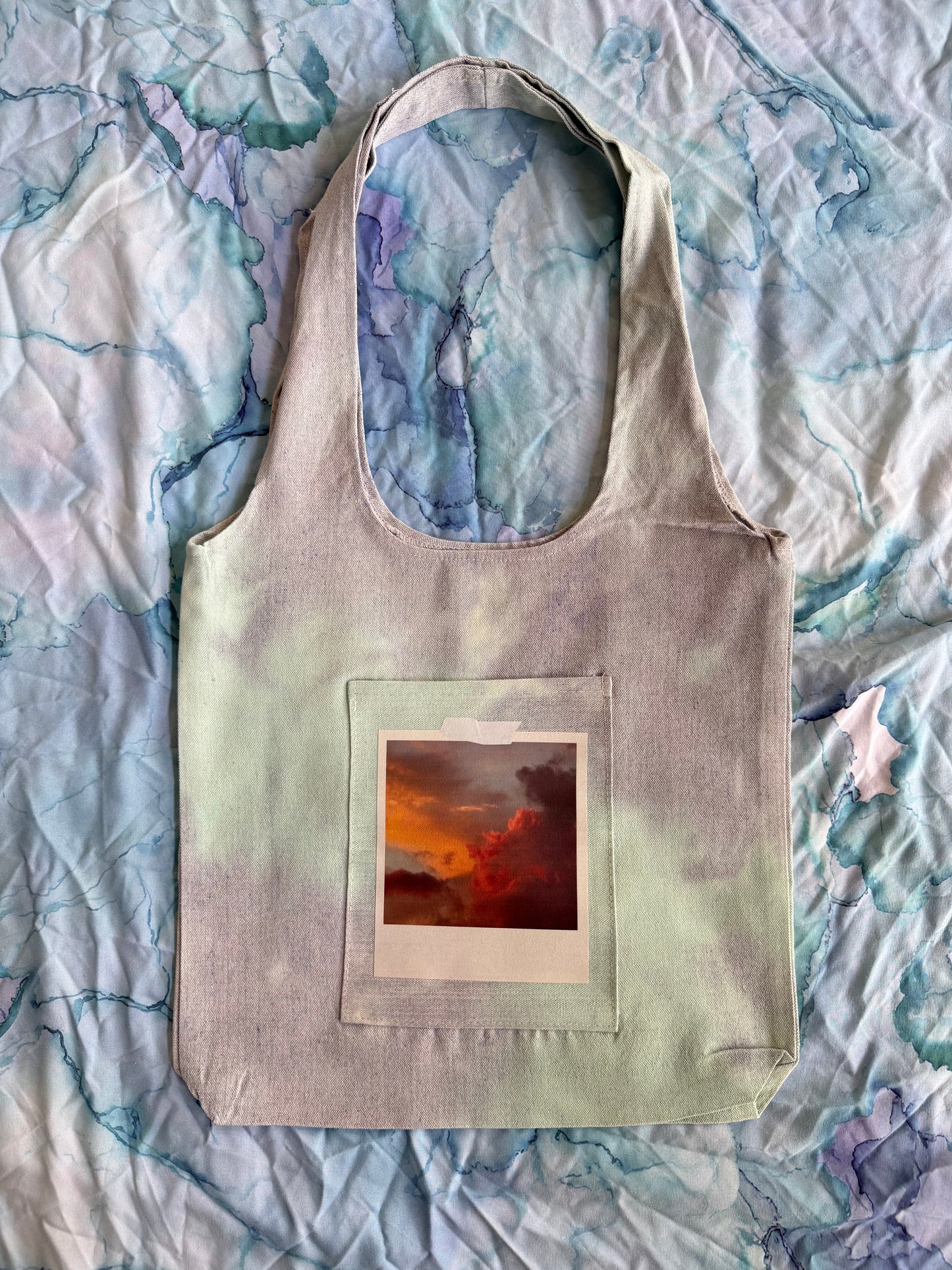 Where Clouds Collide Tote Bag